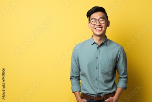 Asian man smiling standing portrait © blvdone