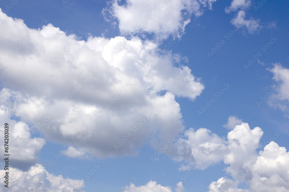 Beautiful blue sky background with natural white clouds. Beautiful blue sky background with natural white clouds.