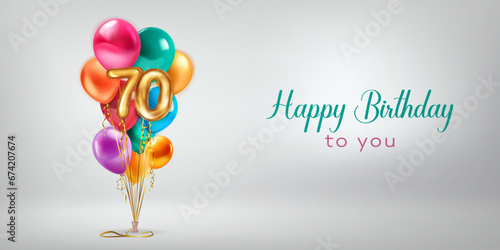 Festive birthday illustration with a bunch of colored helium balloons, golden foil balloons in the shape of the number 70 and lettering Happy Birthday to you on white background