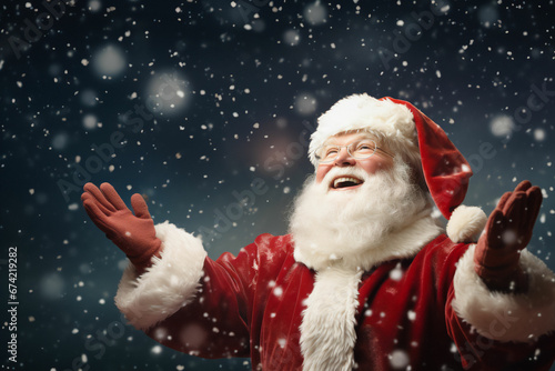 Santa Clause smiling with raised arms  looking up. Happy Santa Clause