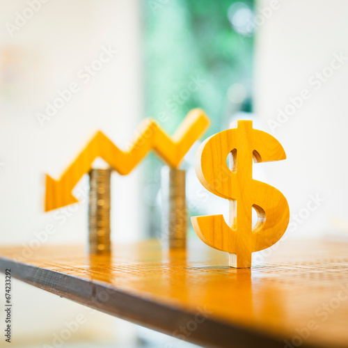 Dollar sign symbol and down arrow, concepts for success, methods, systems of raising or lowering Fed interest rates to correct inflation concepts.