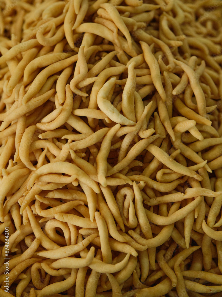 Indonesian Cheese stick snacks or Pilus Keju after fried from the pan. Indonesian Cheese stick snacks or Pilus Keju after fried from the pan.