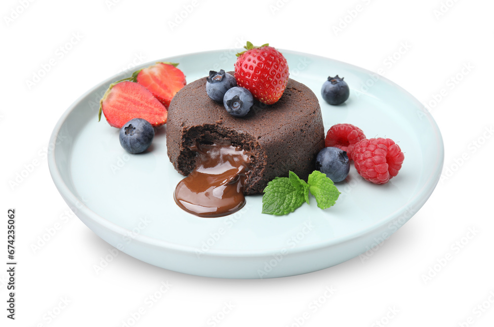 Plate with delicious chocolate fondant, berries and mint isolated on white Plate with delicious chocolate fondant, berries and mint isolated on white