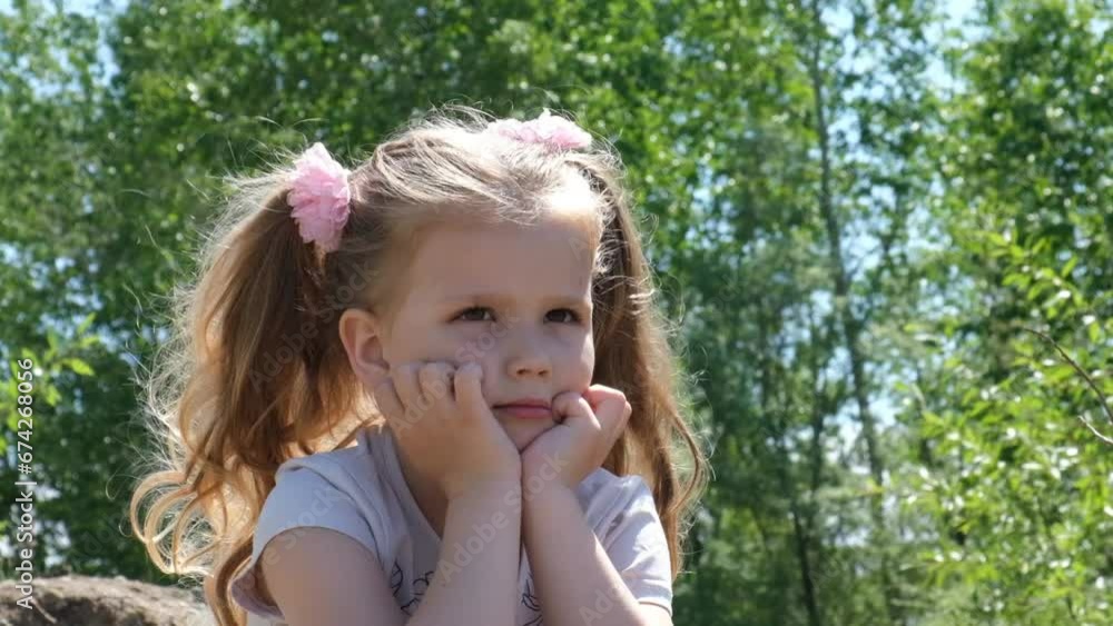 Portrait of contemplating, thinking little girl outdoors, outdoors. Walking, thoughtfulness, loneliness. Portrait of contemplating, thinking little girl outdoors, outdoors. Walking, thoughtfulness, loneliness.