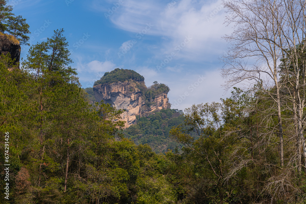 The top of the rock around Danxia formation in Wuyishan, Fujian, China The top of the rock around Danxia formation in Wuyishan, Fujian, China
