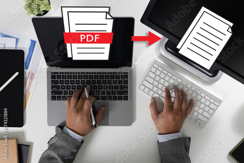 PDF button on screen Laptop computer converting process of document to another format Convert PDF files with online programs. photo