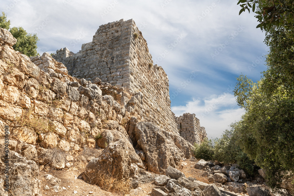 Outer  walls and guard towers in the medieval fortress of Nimrod - Qalaat al-Subeiba located near the border with Syria and Lebanon in the Golan Heights, in northern Israel
