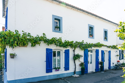 Street white houses in the center of Noirmoutier Vendee France  photo