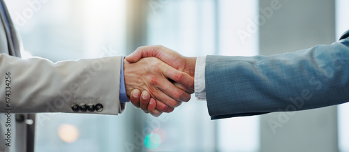 Business people, support and shaking hands for agreement, meeting and b2b deal for success, welcome and reward. Closeup, handshake and introduction of partnership, integration and recruitment offer photo