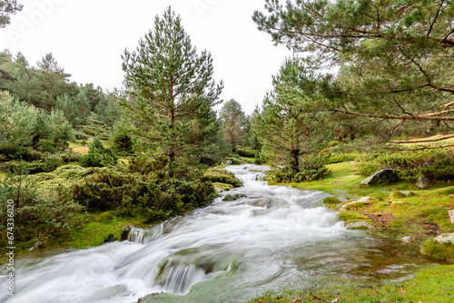 mountain river with a lot of water due to the autumn rains in the Sierra de Guadarrama in Madrid, Spain