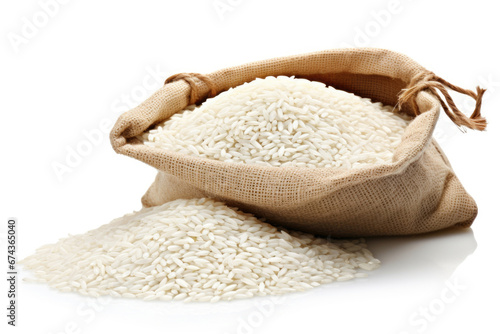 Open burlap bag of white long grained rice on white background