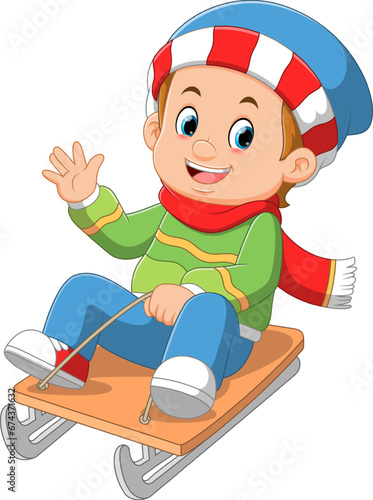 Cartoon little boy sledding down a hill