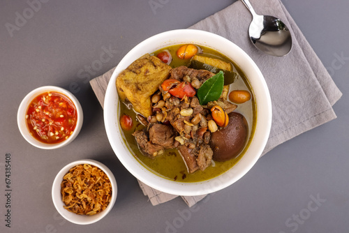Brongkos is a Yogyakarta Spicy Meat and Bean Stew with a Special Spice, Kluwek in Coconut Milk Soup.
