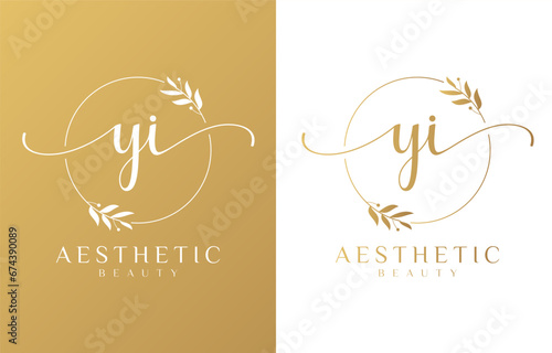 Letter Y and I Beauty Logo with Flourish Ornament