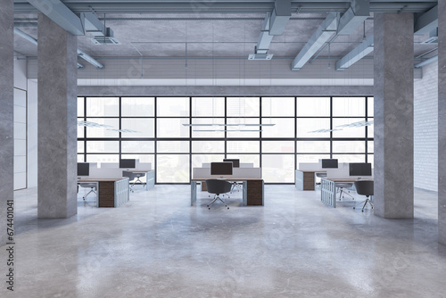 Clean warehouse office interior with window and city view, furniture, concrete flooring and columns. 3D Rendering.