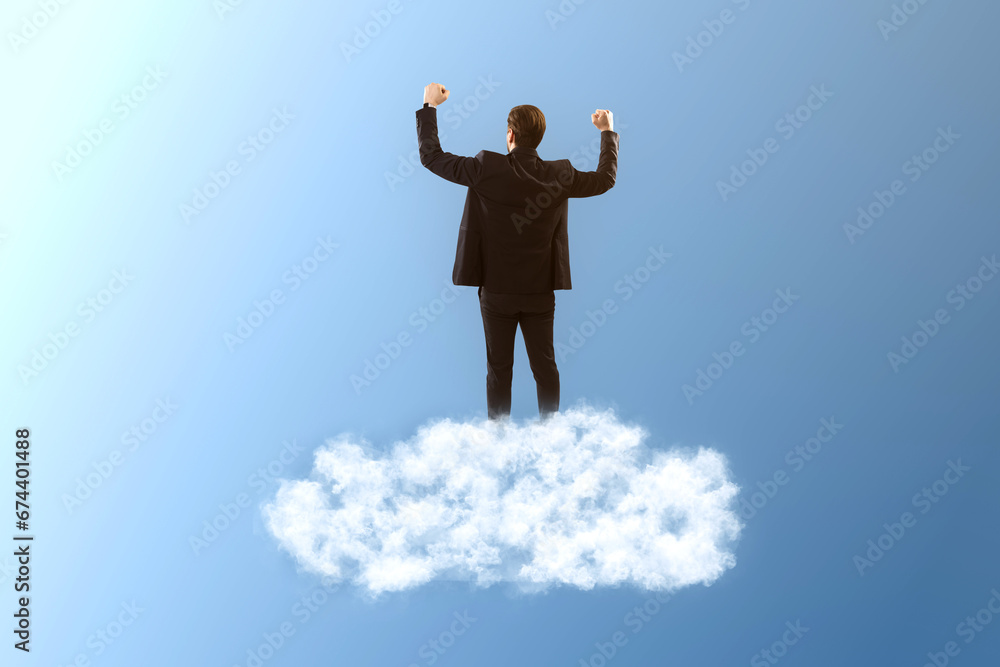 Back view of young caucasian businessman standing on cloud. Blue sky background. Dream big, business and strategy, forethought and vision concept. Back view of young caucasian businessman standing on cloud. Blue sky background. Dream big, business and strategy, forethought and vision concept.