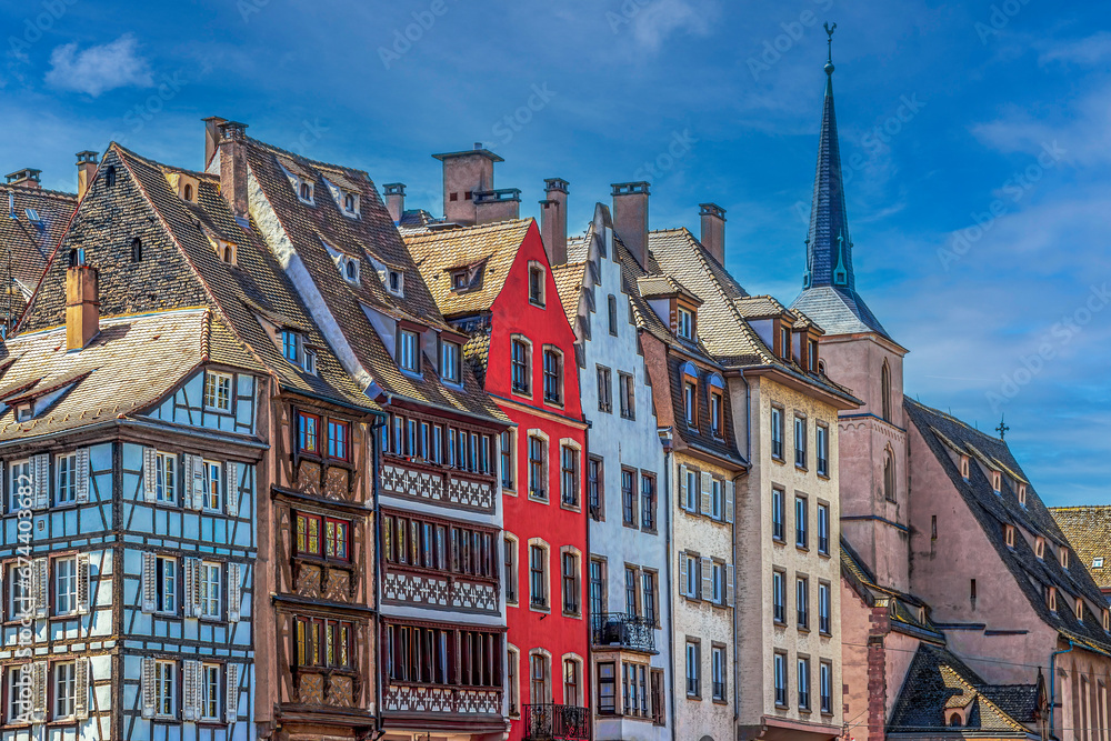 View of medieval houses with traditional Alsatian architecture on the Quai Saint-Nicolas, Strasbourg, France