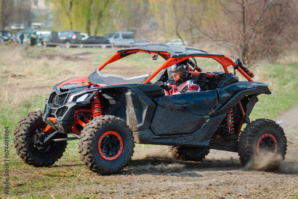 ATV and UTV offroad vehicle racing in dust. Extreme, adrenalin. 4x4 ATV and UTV offroad vehicle racing in dust. Extreme, adrenalin. 4x4