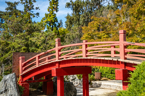 Red bridge in Japanese Friendship Garden. Japanese Friendship Garden in Kelley Park.  photo