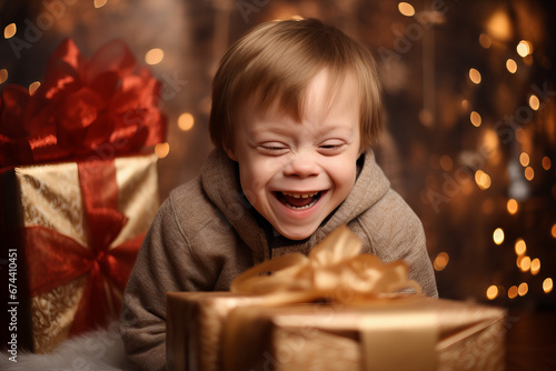 excited boy with down syndrome with a Christmas gift and Christmas tree in the background, candid cosy atmosphere