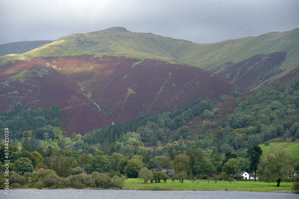 The Fairfield range towers above the lake at Grasmere in the Lake District