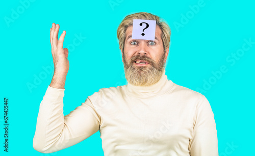 Paper notes with question marks. Beard man question mark in head, solution problems. Thinking man with question mark on blue background. Man with question mark on forehead