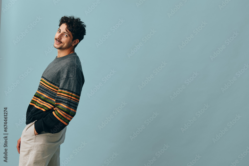 Isolated man lifestyle hipster fashion handsome sweater face one trendy smile portrait copyspace expression Isolated man lifestyle hipster fashion handsome sweater face one trendy smile portrait copyspace expression