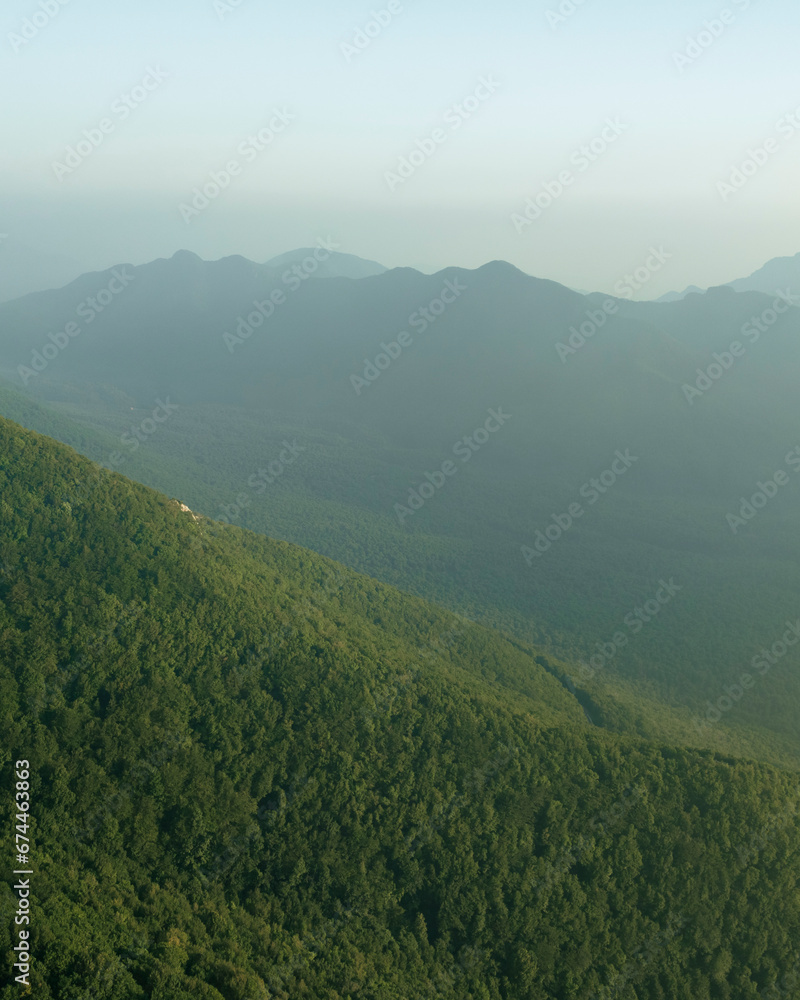 Aerial view of a mountain landscape from Ripe della Falconara lookout on Mount Terminio, Serino, Campania, Avellino, Italy. Aerial view of a mountain landscape from Ripe della Falconara lookout on Mount Terminio, Serino, Campania, Avellino, Italy.