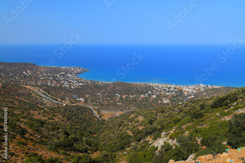 Scenic view of Malia bay with Malia and Stalida in the distance, Crete, Greece, Europe.