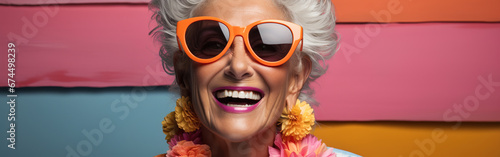 senior woman in bold tropical colouful style photo