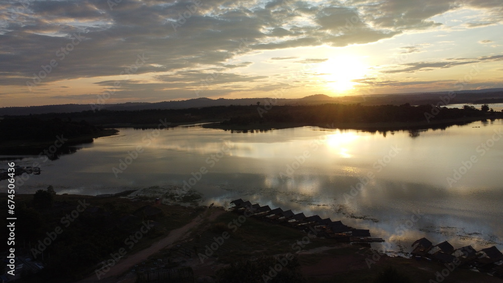 sunrise over the Nam Houm Reservoir lake