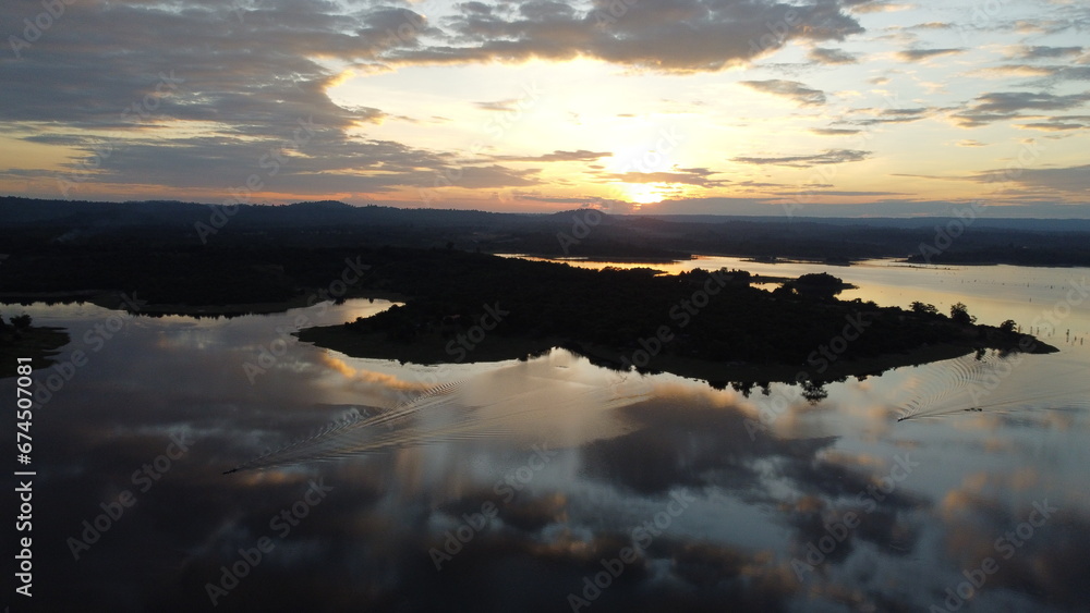 sunrise over the Nam Houm Reservoir lake