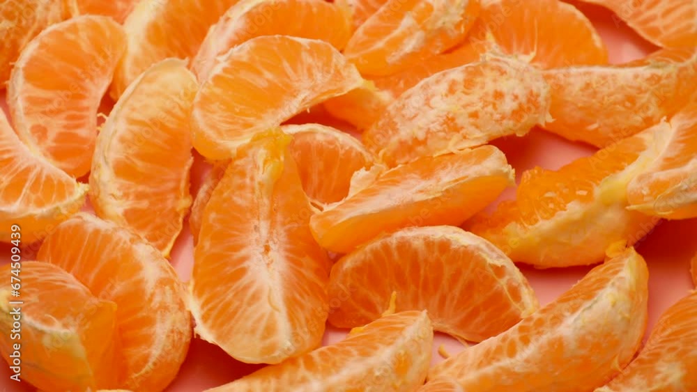 Tangerine slices, rotation in circle. orange fresh peeled tangerines, Turning. selective focus Tangerine slices, rotation in circle. orange fresh peeled tangerines, Turning. selective focus