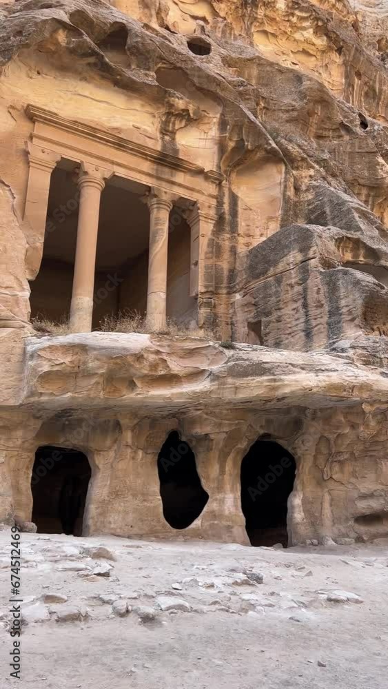Ancient imitation monument to the Petra Treasure hidden in Little Petra, Jordan. Ancient imitation monument to the Petra Treasure hidden in Little Petra, Jordan.
