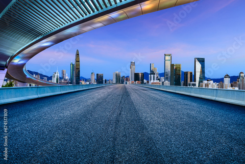 Asphalt road and urban skyline with modern buildings in Shenzhen, Guangdong Province, China.