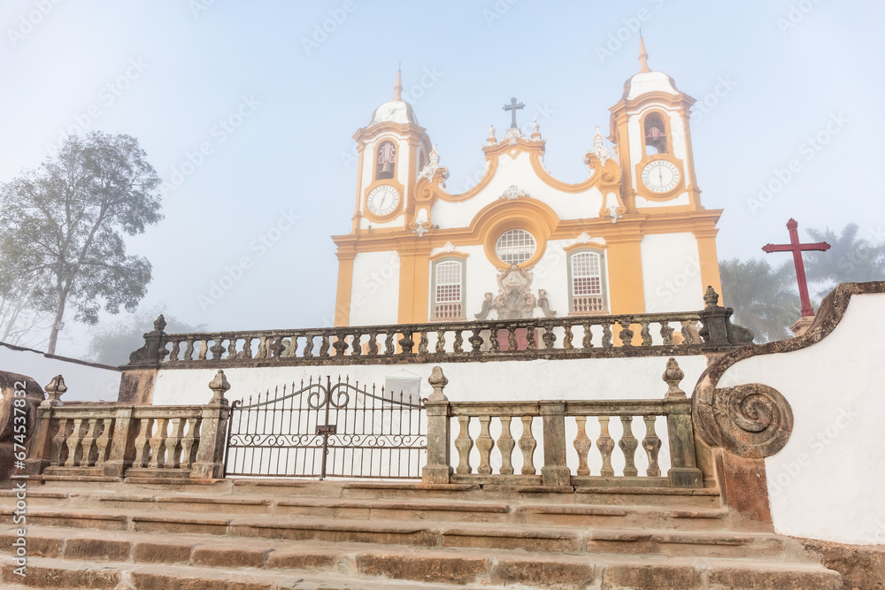 Fog with a view of the Santo Antonio Catholic Church in the city of Tiradentes in Minas Gerais