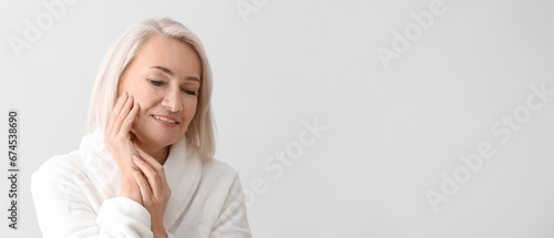 Mature woman giving herself...