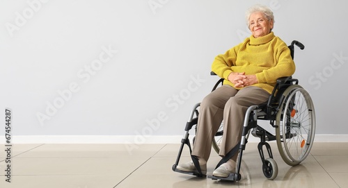 Senior woman in wheelchair ...