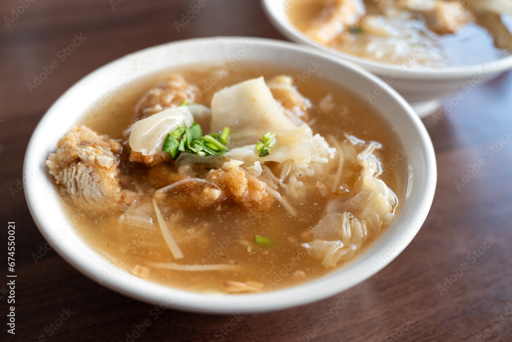 Delicious fried narrow-barred Spanish mackerel fish fillet with rice and noodles in thick soup in Taiwan. Delicious fried narrow-barred Spanish mackerel fish fillet with rice and noodles in thick soup in Taiwan.
