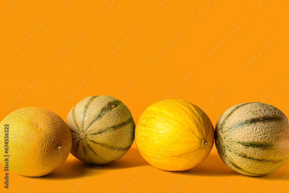 Different sweet melons on colorful background Different sweet melons on colorful background