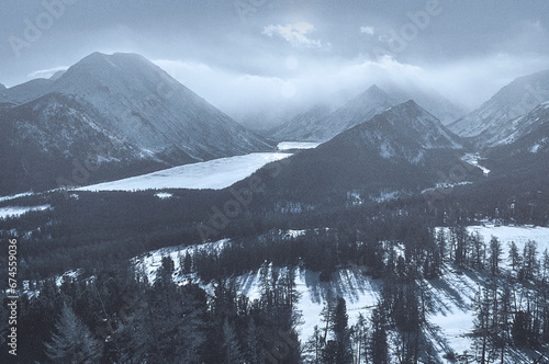 Snow-covered winter mountain lake, Russia, Siberia, Altai mountains. Multinskie lakes. photo