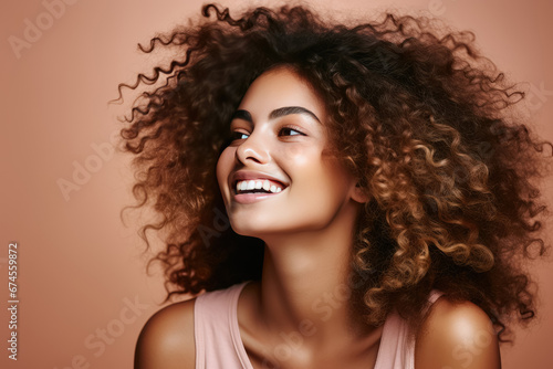 Portrait of beautiful african woman smiling with clean healthy skin an afro hairstyle