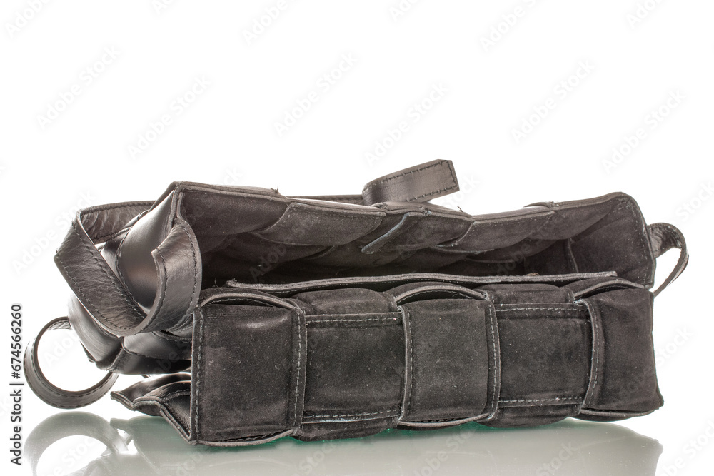 Naklejka premium One leather women's bag, macro, isolated on white background.