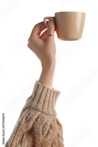 Woman holding beige cup of hot coffee on white background