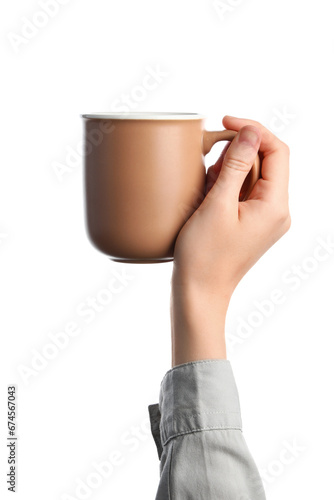 Hand holding brown ceramic ...