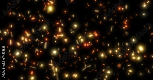 Abstract bright background of flying yellow glowing orange fire sparks from a fire on a black background