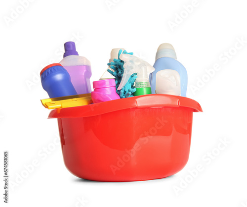 Bowl with cleaning products on white background