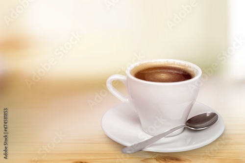 Hot tasty latte coffee in a ceramic cup