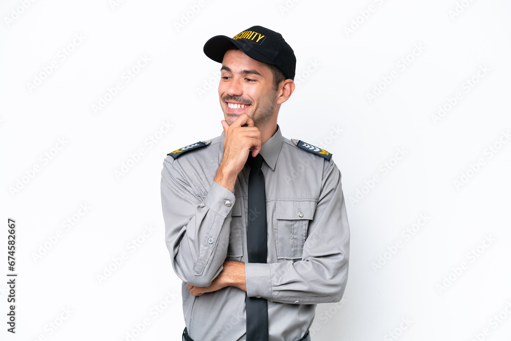 Young safeguard man over isolated white background looking to the side Young safeguard man over isolated white background looking to the side