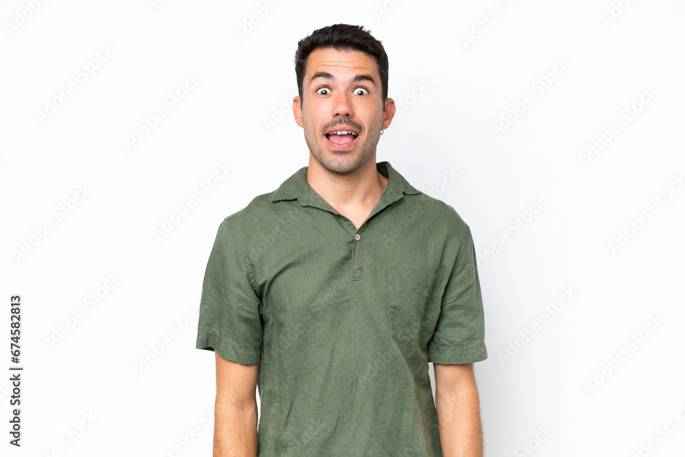 Young handsome man over isolated white background with surprise facial expression Young handsome man over isolated white background with surprise facial expression